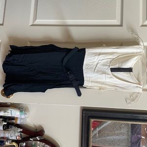 Black and off white romper with belt. Size 7/8